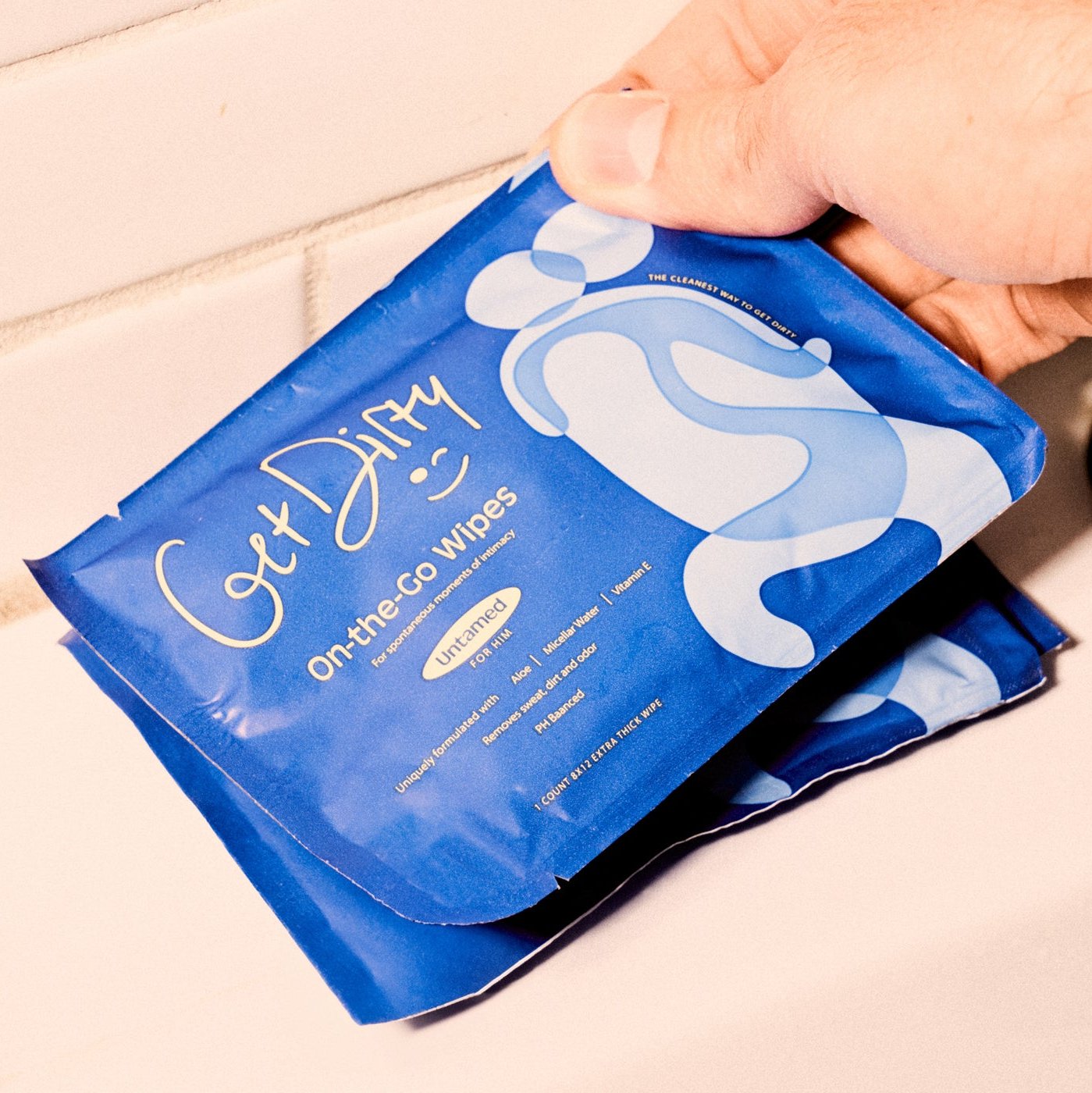 Get Dirty Men's Body Cleansing Wipes 12-pack box with resealable closure